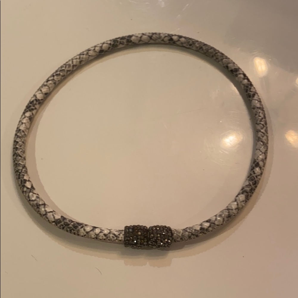 Snakeskin choker with medal studded magnetic clasp